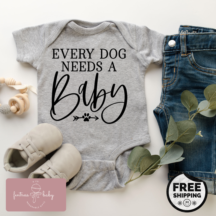 Every Dog Needs A Baby Pregnancy Announcement Onesie
